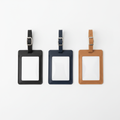 Luggage Tags Set of 3 – faux leather in black, navy, and tan with clear ID window, flat lay on white background